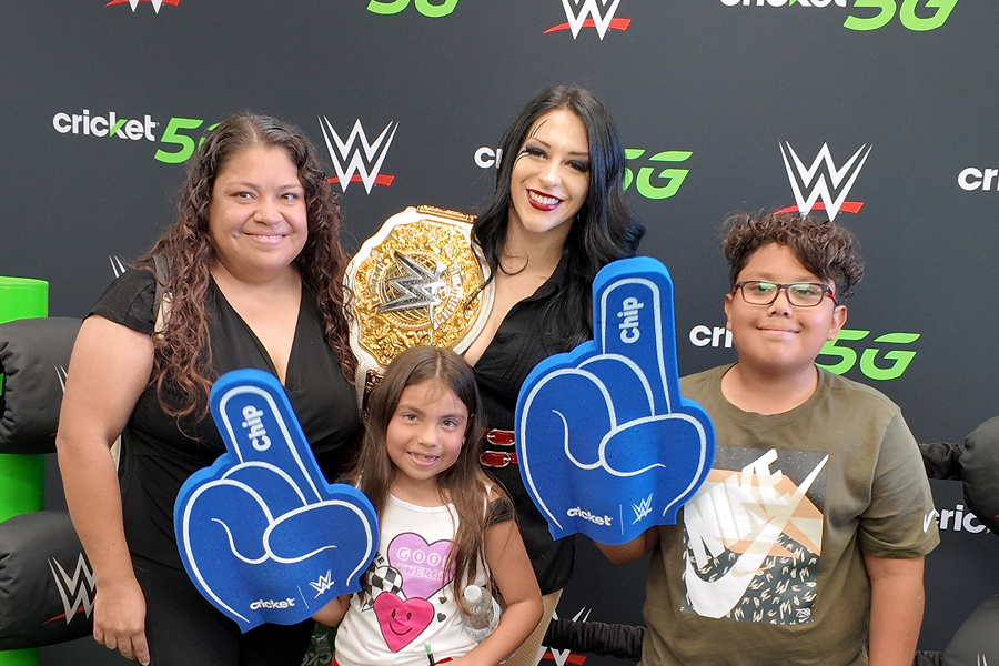 WWE fans with foam fingers at WWE and Cricket Wireless event