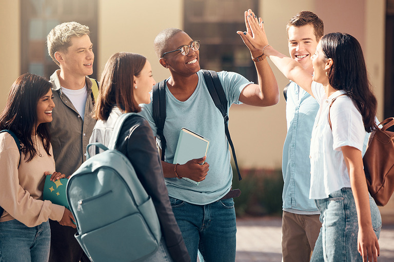 College students high fiving